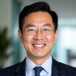 Professional headshot of David Chen, a friendly and approachable man in his 40s.